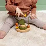 36-517 - Jucarie motrica bebelusi - labirint din margele si mini-turn stivuire - dinozaur - Trixie Baby